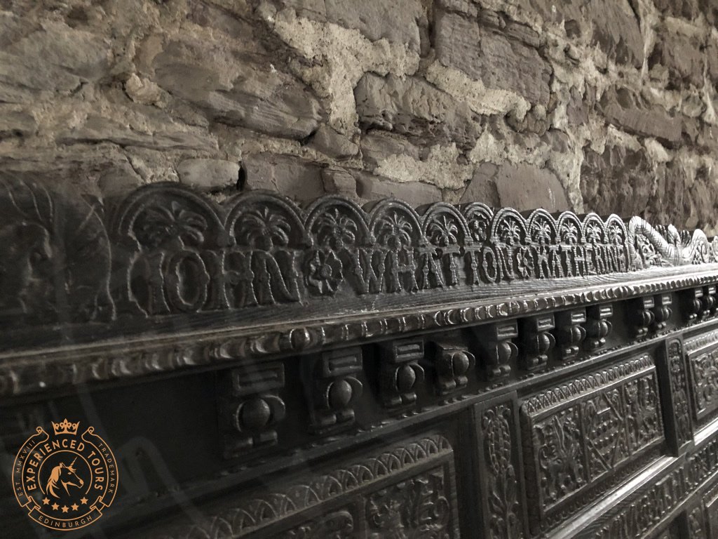 Ornate Carvings on an old Pew